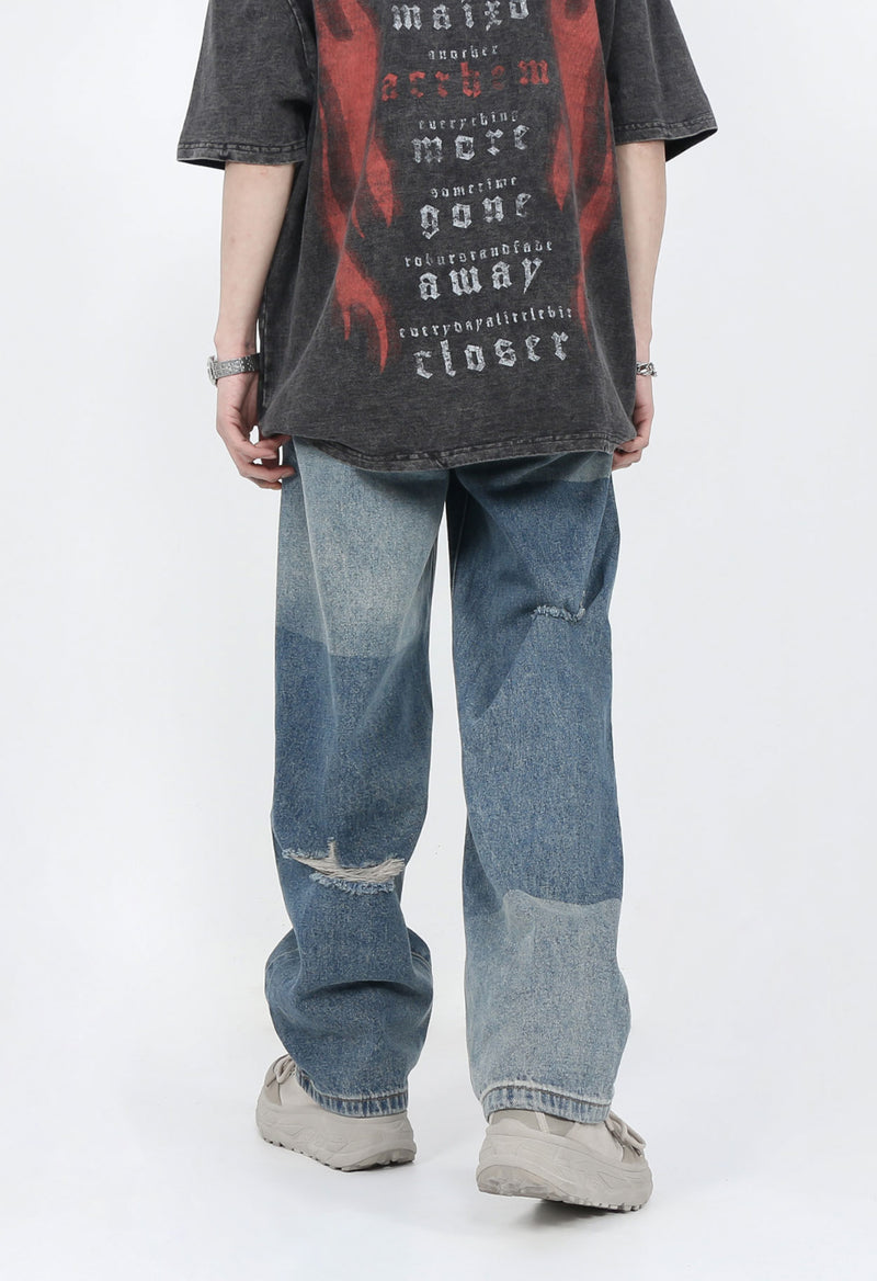 DISTRESSED PATCHED JEANS