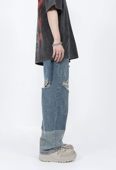 DISTRESSED PATCHED JEANS